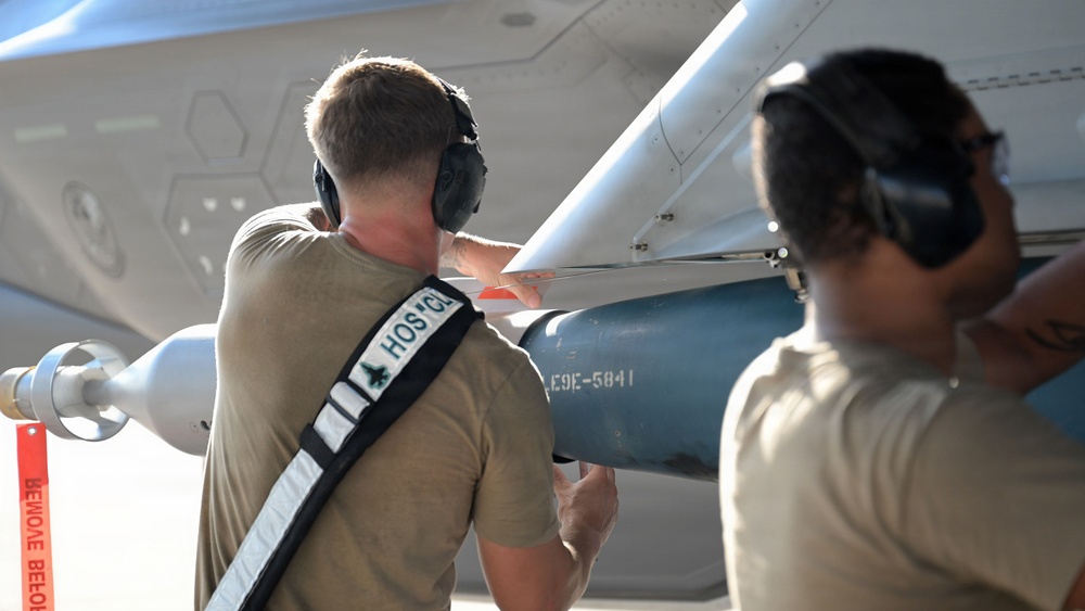 125th Fighter Wing weapons Airmen prepare and load munitions onto F-35A Lightning II aircraft