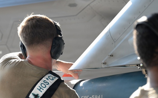 125th Fighter Wing weapons Airmen prepare and load munitions onto F-35A Lightning II aircraft