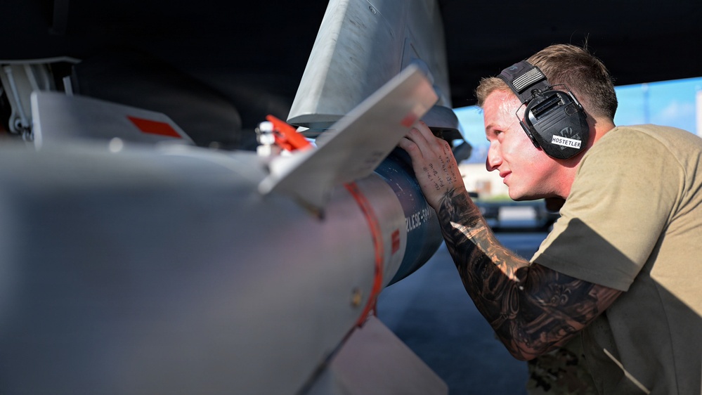 125th Fighter Wing weapons Airmen prepare and load munitions onto F-35A Lightning II aircraft