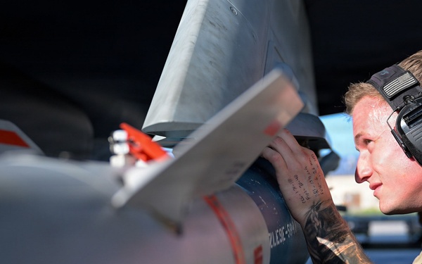125th Fighter Wing weapons Airmen prepare and load munitions onto F-35A Lightning II aircraft