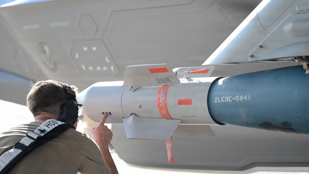125th Fighter Wing weapons Airmen prepare and load munitions onto F-35A Lightning II aircraft