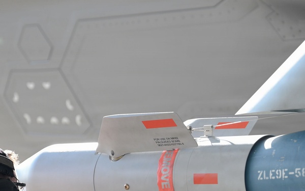125th Fighter Wing weapons Airmen prepare and load munitions onto F-35A Lightning II aircraft
