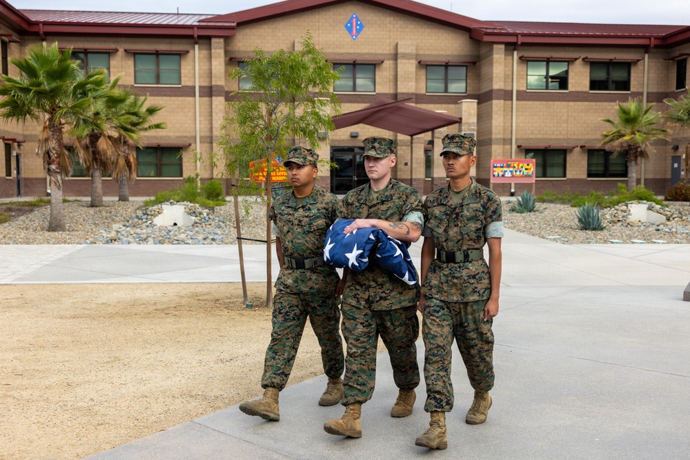 U.S. Marines with 1st MARDIV hold morning colors ceremony