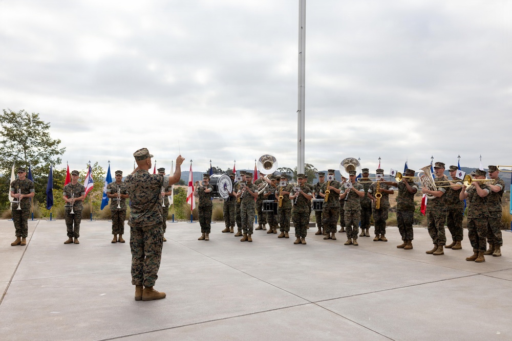 U.S. Marines with 1st MARDIV hold morning colors ceremony