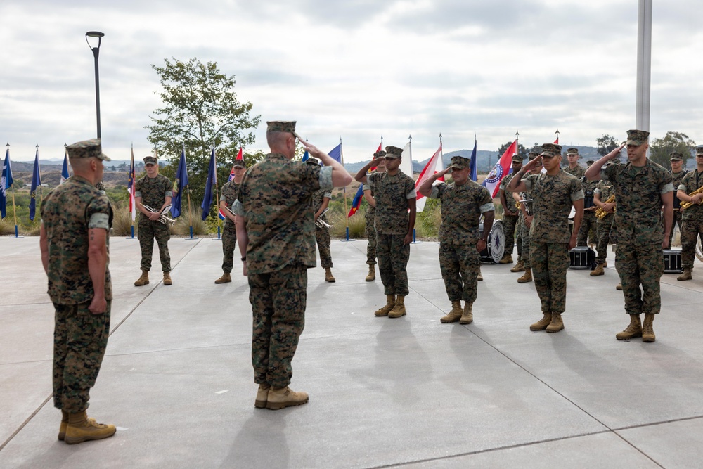 U.S. Marines with 1st MARDIV hold morning colors ceremony