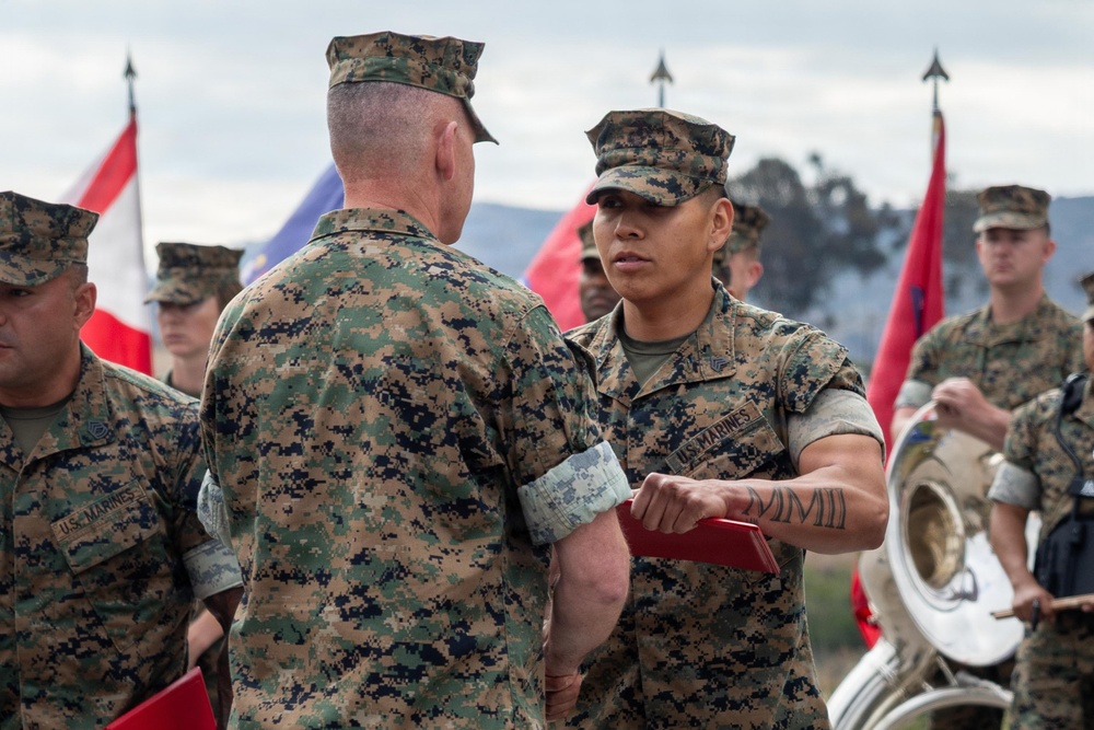 U.S. Marines with 1st MARDIV hold morning colors ceremony