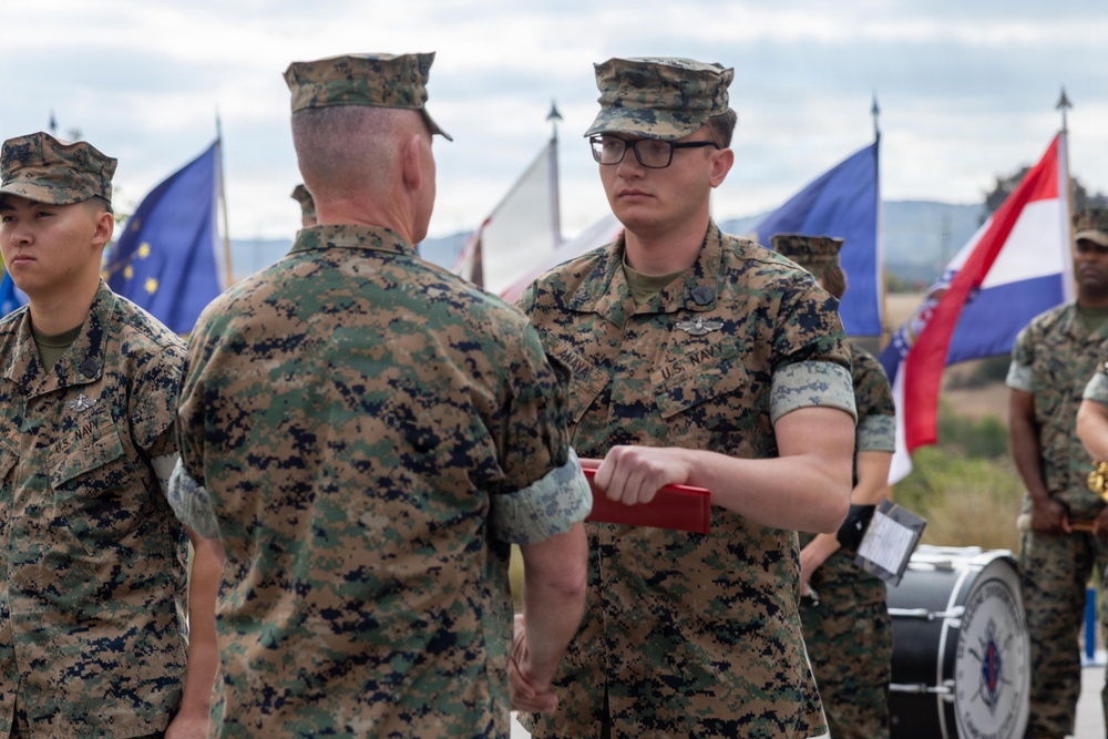 U.S. Marines with 1st MARDIV hold morning colors ceremony