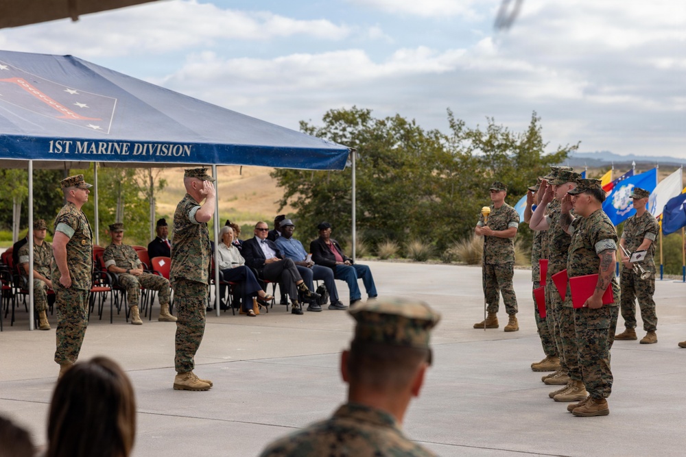 U.S. Marines with 1st MARDIV hold morning colors ceremony