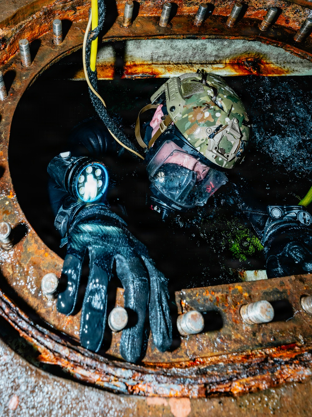 U.S. Navy Divers Conduct Enclosed Space Diving Training