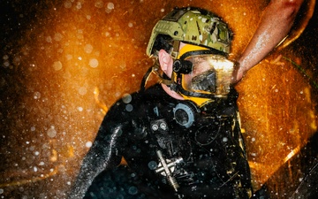 U.S. Navy Divers Conduct Enclosed Space Diving Training