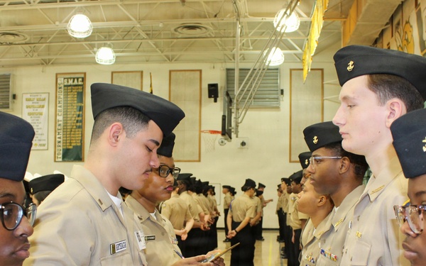 Upholding the Standard: Sailor Tests Cadet's Naval Knowledge