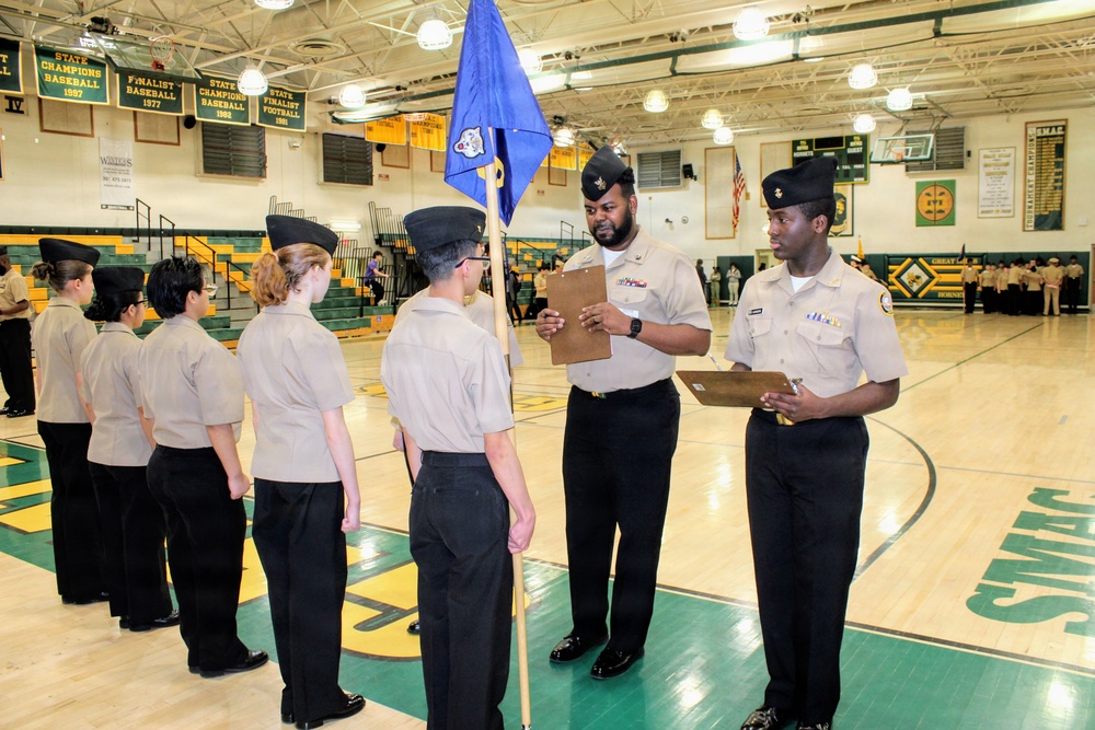 Leadership in Action: Navy Corpsman Inspects NJROTC Platoon