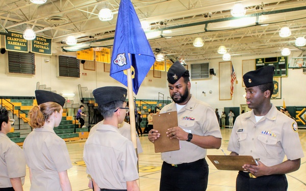 Leadership in Action: Navy Corpsman Inspects NJROTC Platoon