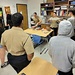 Hands-On Lifesaving Skills: Navy Corpsmen Mentor Middle School Students