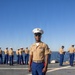 U.S. Marines and Sailors man the rails aboard the USS Arlington (LPD-24)