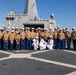 U.S. Marines and Sailors man the rails aboard the USS Arlington (LPD-24)