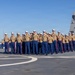U.S. Marines and Sailors man the rails aboard the USS Arlington (LPD-24)