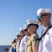 U.S. Marines and Sailors man the rails aboard the USS Arlington (LPD-24)