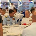 Service members attend reception onboard Philippine Coast Guard Ship BRP Gabriele Siland during RIMPAC