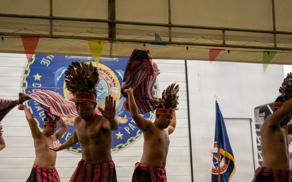 Service members attend reception onboard Philippine Coast Guard Ship BRP Gabriele Siland during RIMPAC