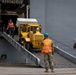 U.S. Marines aboard USS Essex offload cargo