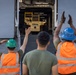 U.S. Marines aboard USS Essex offload cargo