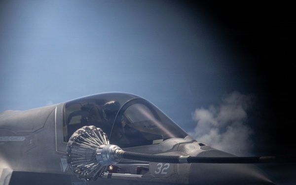 VMGR-152 refuels VMFA-242 aircraft during Valiant Shield