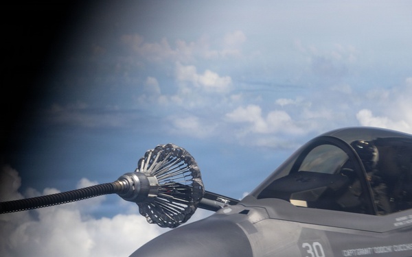 VMGR-152 refuels VMFA-242 aircraft during Valiant Shield