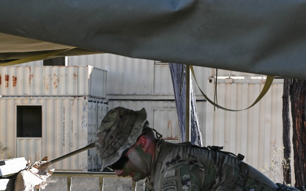 Southern Jackaroo 26: U.S. Army Soldier Unloads Barbed Wire Supply