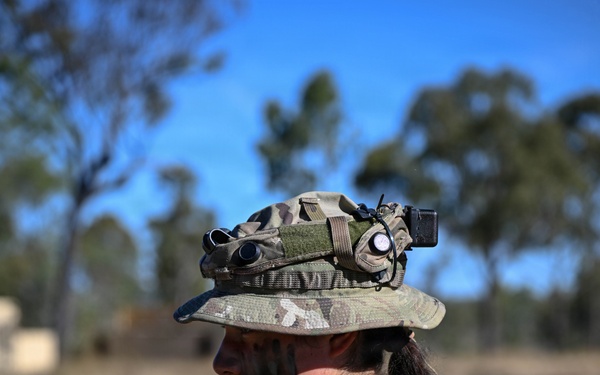 Southern Jackaroo 26: U.S. Army Soldier Observes a Shipment of Barbed Wire Being Opened
