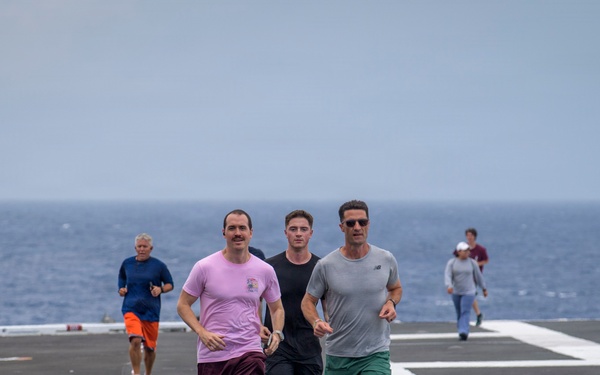 USS Nimitz conducts 5k Flight Deck Run during Tiger Cruise