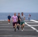 USS Nimitz conducts 5k Flight Deck Run during Tiger Cruise