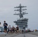 USS Nimitz conducts 5k Flight Deck Run during Tiger Cruise