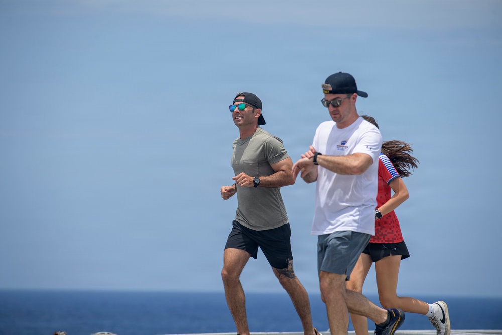 USS Nimitz conducts 5k Flight Deck Run during Tiger Cruise