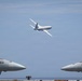 P-8A Poseidon conducts flyby over USS Nimitz (CVN 68)