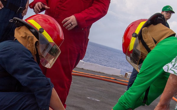 USS Nimitz Conducts General Quarters Drill during Tiger Cruise
