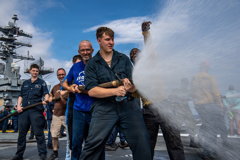 USS Nimitz Conducts General Quarters Drill during Tiger Cruise