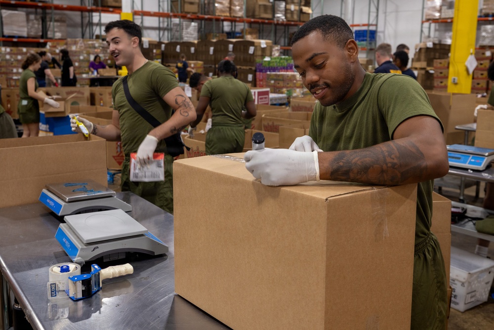 Sailors, Marines Volunteer at Maryland Food Bank During SAIL250 Maryland