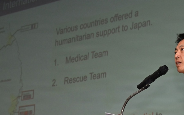 Japanese military officer briefs medical symposium during RIMPAC 26