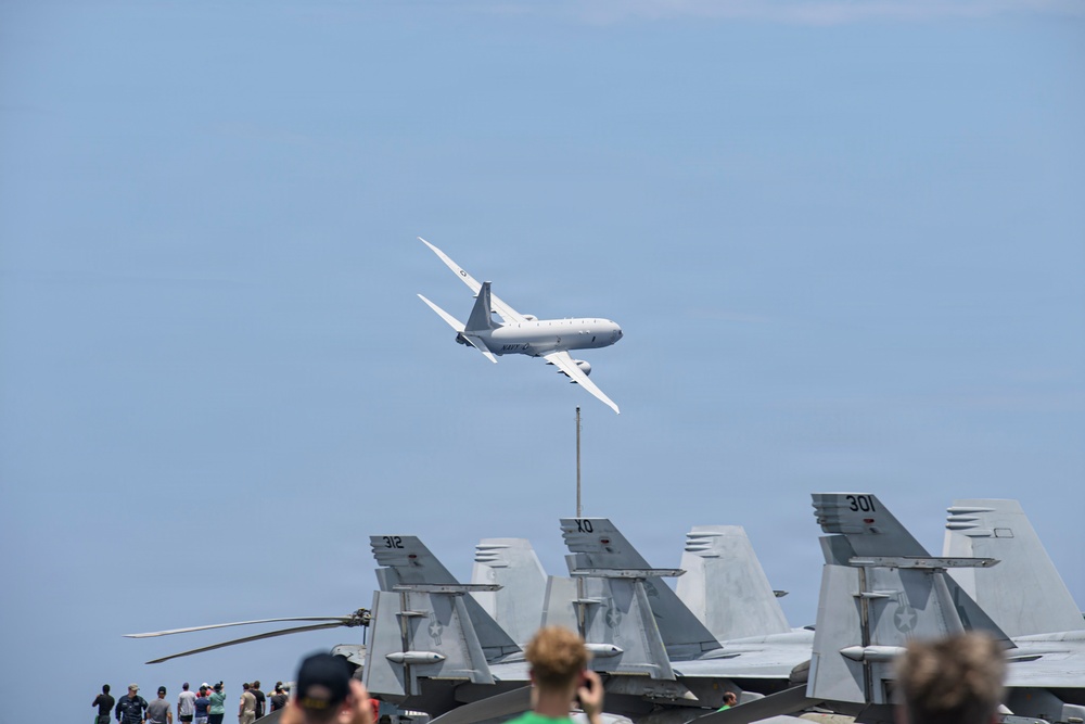 USS Nimitz Conducts Tiger Cruise