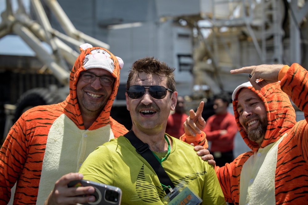 USS Nimitz Conducts Tiger Cruise