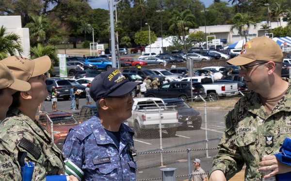 U.S. Navy Sailors tour Japanese destroyer during RIMPAC 26 open ship event
