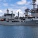 Royal New Zealand Navy vessel and U.S. Navy aircraft carrier moor at Joint Base Pearl Harbor-Hickam for RIMPAC 26