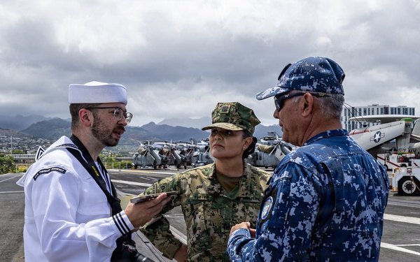 U.S. Navy and Mexican Navy leaders engage during RIMPAC 26 open ship event