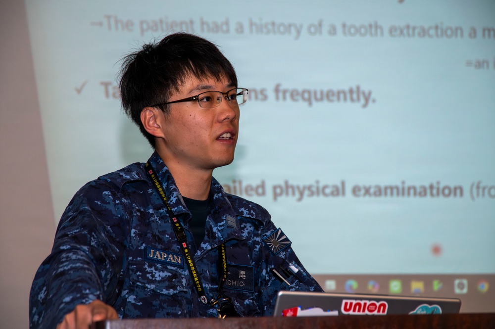 Multinational service members participate in a RIMPAC medical training