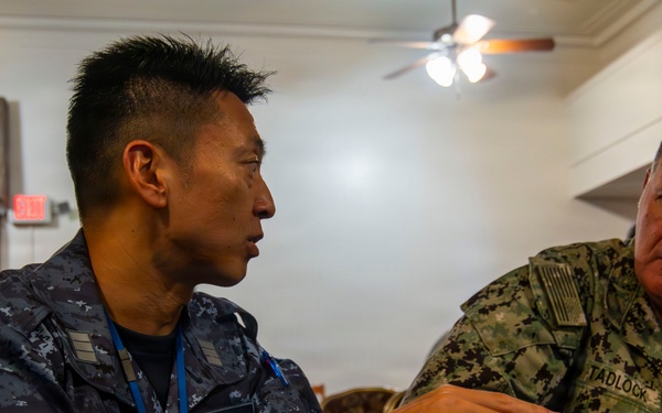 Multinational service members participate in a RIMPAC medical training
