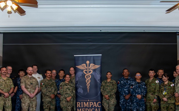 Multinational service members participate in a RIMPAC medical trainings