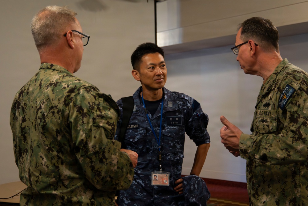 Multinational service members participate in a RIMPAC medical trainings