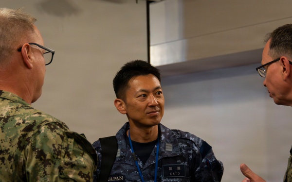 Multinational service members participate in a RIMPAC medical trainings