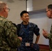 Multinational service members participate in a RIMPAC medical trainings